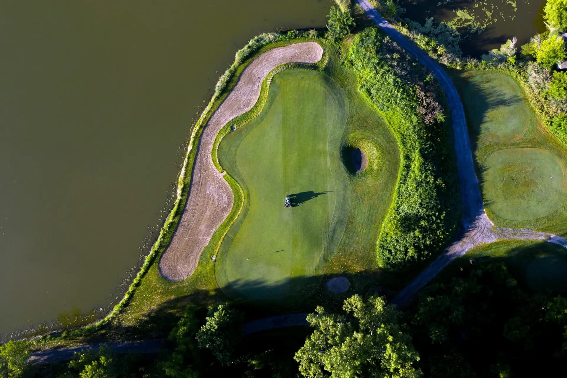 Golfer on a green keeping score